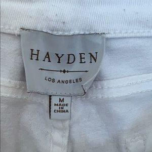 White ankle length Hayden with ruffle bottom jeans